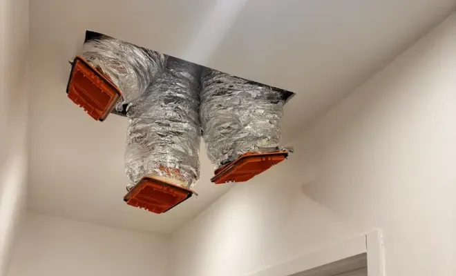Installation d’un système de chauffage climatisation avec réseau de gaines et grilles décoratives, Jonzac, DONOVAN CHARTIER ELEC